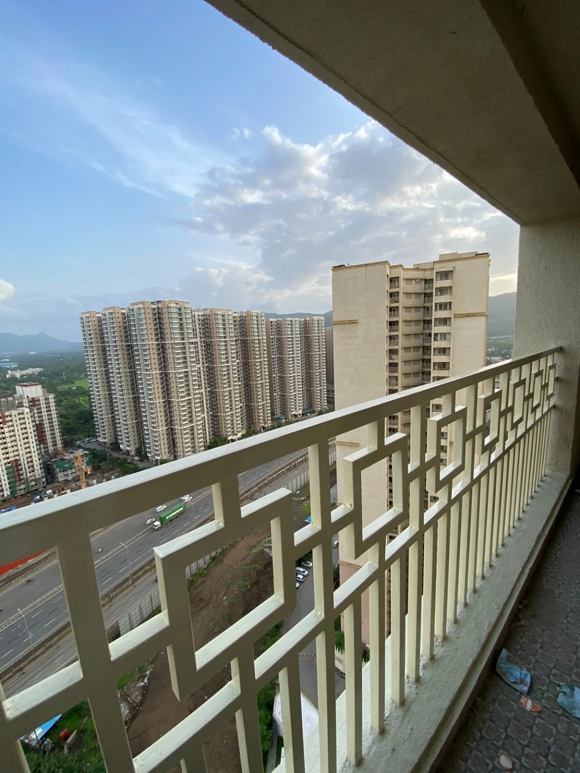 Decorative geometric balcony safety railing on a residential high-rise